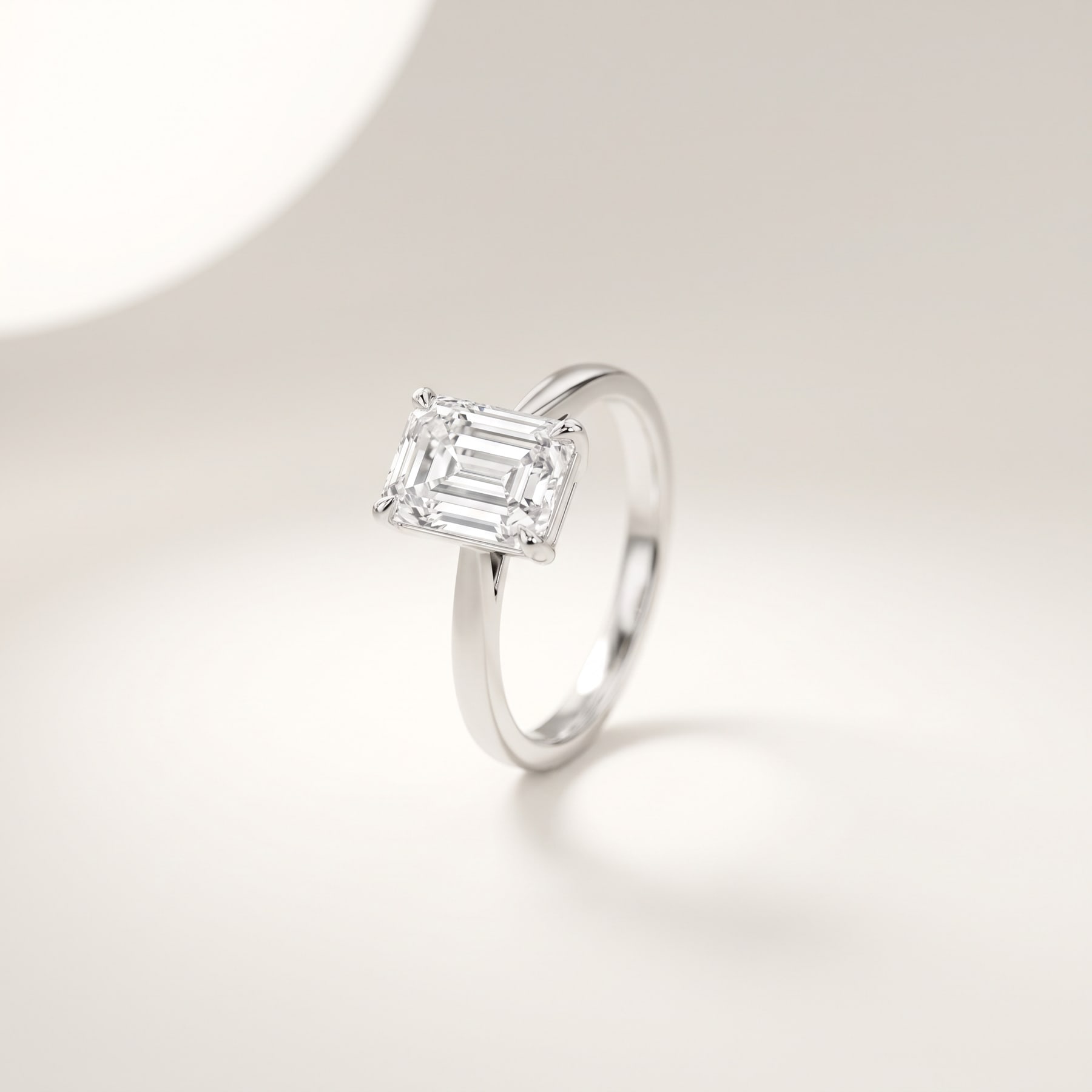 Emerald Cut Ring, in 18k White Gold with a Step-Cut Diamond